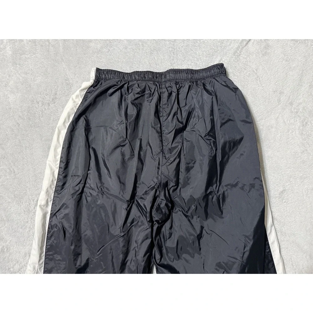 VTG Nike Mens XL Track Pants Windbreaker Black Nylon Ankle Zip Running